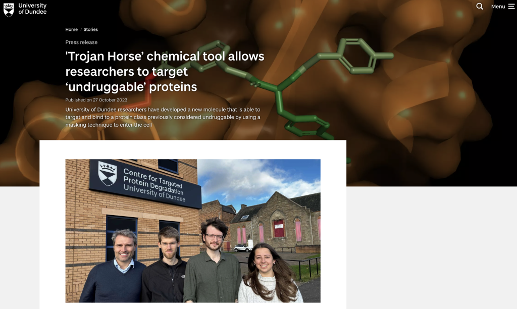 Photo of group inset below image of SOCS2 graphic