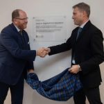 Professor Alessio Ciulli shake hands with Minister Freeman