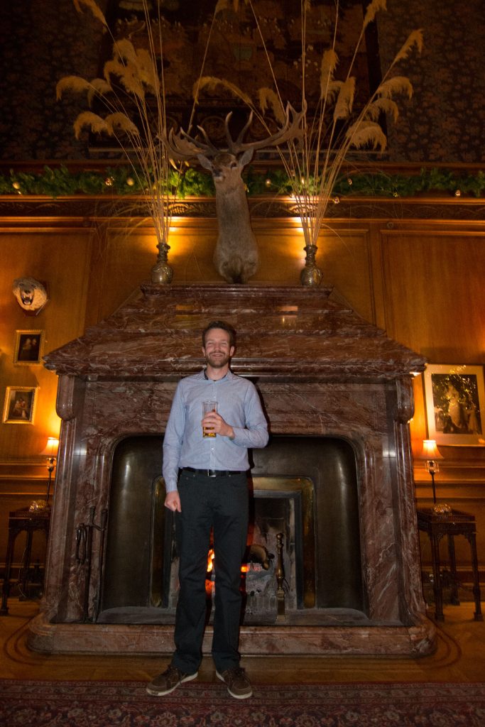 Standing in front of the large fireplace in Alyth at Christmas party 2014