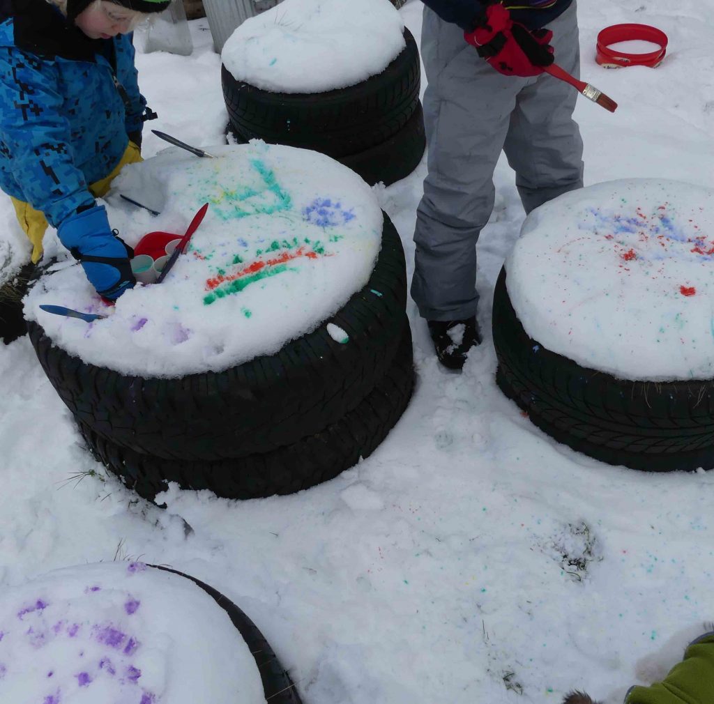 splatting paint into snow