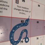 Close up of snakes and ladders game