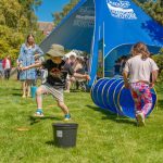 Children taking part in activities in the garden