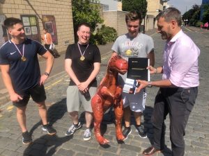 Inflatable dinosaur is given dodgeball medal